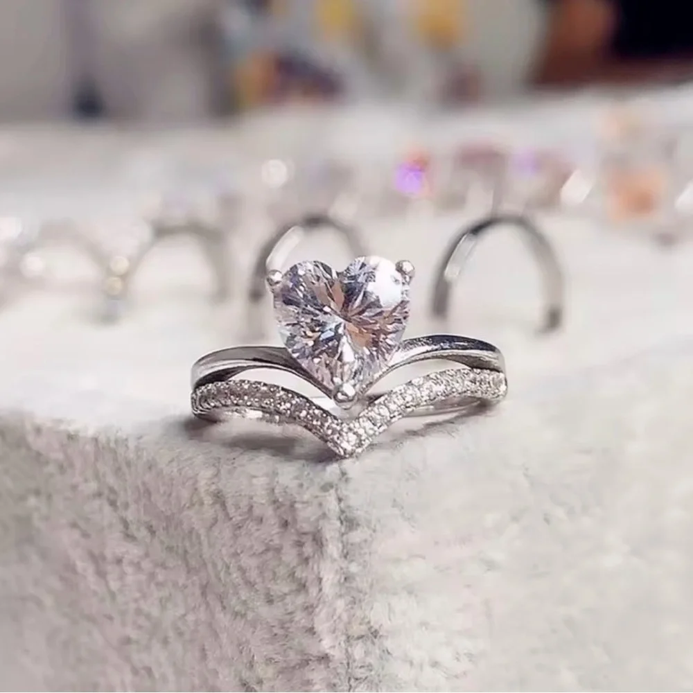 Silver Heart Ring with Crystal Accents.